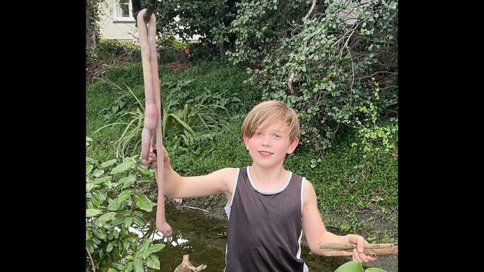 9-Year-Old Boy Catches Earthworm of Epic Proportions