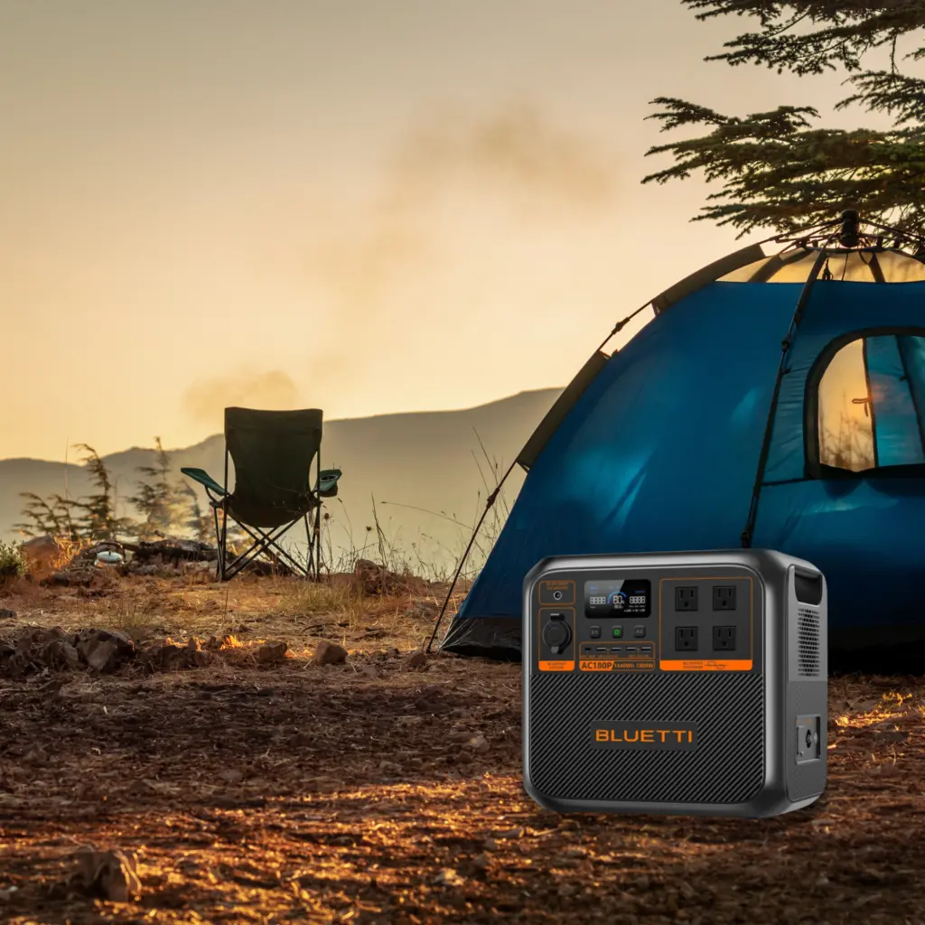 BLUETTI AC180P Solar Portable Power Station at a campsite 